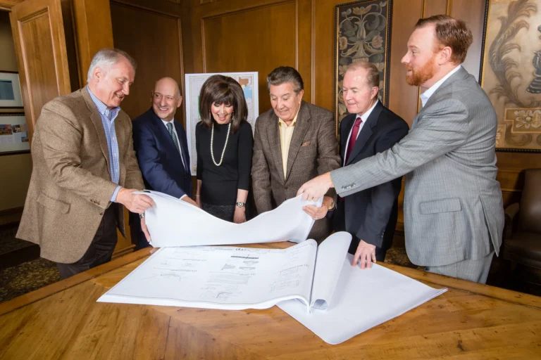 mccaffrey-group-looking-at-building-plans